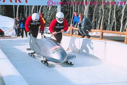 Stock Photo #9722: keywords -  aerodynamic bobsled bobsledding bobsleds chilly city cold colorful downhill fast freeze freezing froze frozen horz ice icy park push pushing race racer racers racing run season shape sled sledding sleds slide sliding slippery speed sport sports start team utah winter