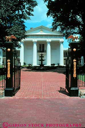 Stock Photo #13957: keywords -  architecture arkansas brick building capitol capitols design greek historic house legislature little old path pavement politics red rock sidewalk site state style vert