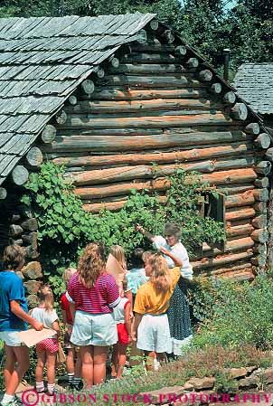Stock Photo #13971: keywords -  arkansas building center cultural culture demonstrate demonstrates demonstrating display displays folk group groups guided heritage history living log mountain museum museums old ozark reconstruction reenact reenacting reenactment reenacts style summer tour tourist tourists tours tradition traditional vert view