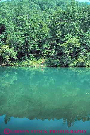 Stock Photo #13975: keywords -  arkansas blanchard calm diminutive fish fisherman fishing flat freshwater lake lakes man mountain people person quiet relax relaxing shore small springs tiny vacation vert view water