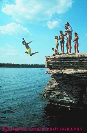 Stock Photo #13983: keywords -  arkansas child children ferry freshwater gravity greers jump jumping jumps kid kids lake lakes leap leaper leaping leaps ledge play playing plays rock swim swimming vert water