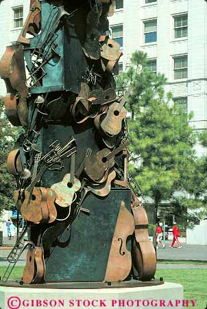 Stock Photo #11300: keywords -  america guitar guitars instrument instruments mall memphis metal mid musical sculpture sculptures tennessee vert