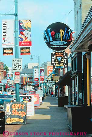 Stock Photo #11319: keywords - advertisements advertising beale building buildings district downtown memphis music neighborhood sidewalk sign signs street tennessee urban vert