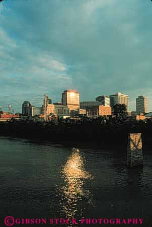 Stock Photo #7637: keywords -  america american architecture building buildings business center cities city cityscape cityscapes cumberland downtown high modern nashville new office reflect reflection reflects rise river skyline skylines sun tennessee urban usa vert water waterfront