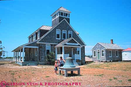 Stock Photo #9541: keywords -  banks beach beaches bell building cape carolina chicamacomico coast coastal daughter destination hatteras historic horz mother north outer released resort resorts seashore shore shoreline site station summer travel vacation