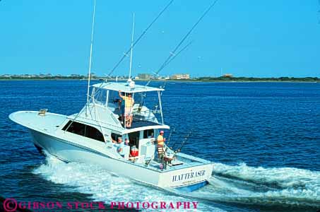 Stock Photo #9546: keywords -  banks beach beaches boat boats cape carolina charter coast coastal destination fish fishing hatteras horz motorboat movement moving north ocean outer power recreation rent rental resort resorts sea seashore shore shoreline sport summer travel vacation yacht