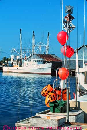 Stock Photo #9555: keywords - banks beach beaches boats cape carolina coast coastal commercial destination dock fishing harbor harbors hatteras manteo marina marinas north outer resort resorts seashore shore shoreline summer travel vacation vert