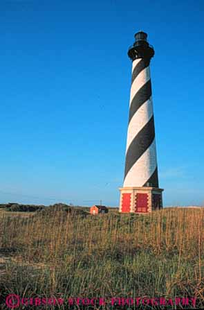Stock Photo #9556: keywords - banks beach beaches cape carolina coast coastal destination famous hatteras high historic house landmark landmarks light lighthouse north outer painted pattern resort resorts sand seashore shore shoreline spiral summer tall tower travel vacation vert