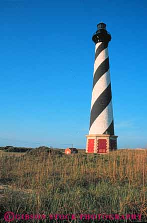 Stock Photo #9556: keywords -  banks beach beaches cape carolina coast coastal destination famous hatteras high historic house landmark landmarks light lighthouse north outer painted pattern resort resorts sand seashore shore shoreline spiral summer tall tower travel vacation vert