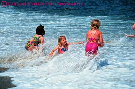 Stock Photo #9565: keywords -  banks beach beaches cape carolina child children coast coastal destination friend friends fun girl girls group happy hatteras horz in north ocean outer play playing resort resorts sand sea seashore shore shoreline smile smiling summer surf swim swimming together travel vacation water wet