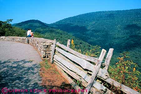 Stock Photo #14048: keywords - appalachia appalachian blue byway carolina countryside couple fence great horz landscape landscapes mountain mountains national north overview park parks parkway people point public rail relax relaxed relaxing ridge road route routes rural scenery scenic smoky split spring summer view viewpoint views vista wood