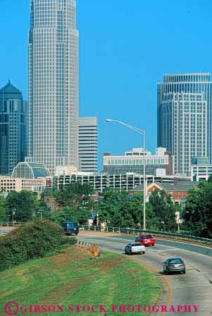 Stock Photo #7638: keywords -  america american architecture auto autos blvd building buildings business car carolina cars center charlotte cities city cityscape cityscapes downtown high independence modern new north office rise road route skyline skylines street traffic urban usa vert