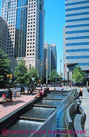 Stock Photo #7639: keywords - america american architecture building buildings business carolina center charlotte cities city cityscape cityscapes downtown fountain high modern new north office plaza rise skyline skylines street urban usa vert
