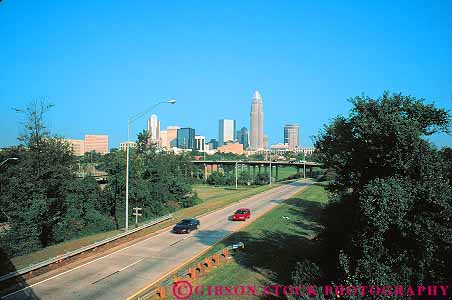 Stock Photo #12204: keywords -  angle buildings car carolina cars charlotte cities city cityscape cityscapes divided downtown freeway highway horz interstate north office road skyline skylines street streets traffic urban wide