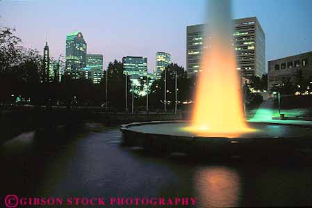 Stock Photo #12209: keywords -  carolina charlotte cities city cityscape cityscapes dark dusk evening fountain fountains horz lighting lights marshall night north orange park parks skyline skylines water