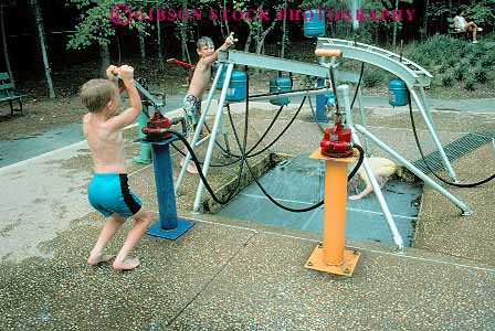 Stock Photo #12371: keywords - boy boys carolina child children cool durham horz kid kids life museum north of play playing refreshing science summer water wet