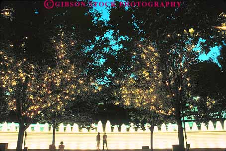 Stock Photo #14073: keywords -  blue bright country downtown fountain fountains grass horz illuminate illuminated illuminates kentucky lexington light lighted lighting lights night people public silhouette silhouettes water