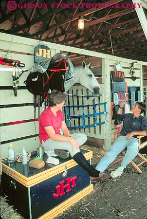Stock Photo #14077: keywords -  animal animals attire blue clothing country dress equipment grass horse horseback horses kentucky lexington park parks people public riding stall stalls state tac vert