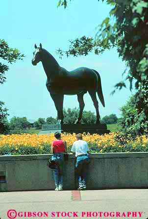 Stock Photo #14078: keywords - animal blue commemorate commemorates commemorating country couple couples grass horse horses kentucky lexington look looking looks mammal man memorial metal o park parks people public see seeing sees state statue statues vert war