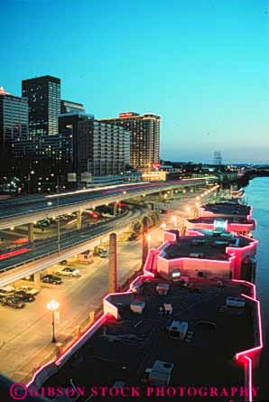 Stock Photo #7647: keywords -  america american architecture building buildings business center cities city cityscape cityscapes dark downtown dusk evening high kentucky lighting lights louisville modern new night office rise skyline skylines urban usa vert