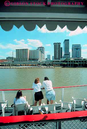 Stock Photo #14131: keywords -  belle boats bost bright charter cities city colorful couple couples design dock docked docks kentucky louisville of ohio old onboard paddle paddles passenger passengers people river riverboat riverboats riverfront rivers ship ships style summer tour touring tourist tourists tours tradition traditional vert vintage waterfront