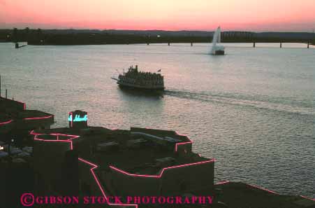 Stock Photo #14135: keywords -  cities city dark dusk evening horz kentucky louisville ohio river riverboat riverboats rivers sunset sunsets tour touring tours