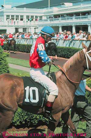 Stock Photo #14137: keywords - animal animals bet bets betters betting churchill course courses downs gamble gambling horse horses job jobs jockey jockeys kentucky landmark louisville mammal mammals occupation occupations people person presents race racer racers races racing ride rider riders rides riding track tracks uniform uniforms vert work worker working works