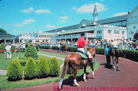 Stock Photo #14138: keywords - animal animals bet bets betters betting churchill course courses downs gamble gambling horse horses horz job jobs jockey jockeys kentucky landmark louisville mammal mammals occupation occupations people person presents race racer racers races racing ride rider riders rides riding track tracks uniform uniforms work worker working works
