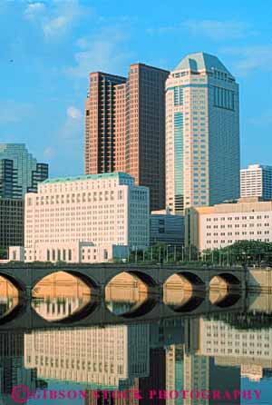 Stock Photo #7651: keywords -  america american architecture building buildings business center cities city cityscape cityscapes columbus downtown high modern new office ohio reflect reflection reflects rise river scioto skyline skylines urban usa vert water