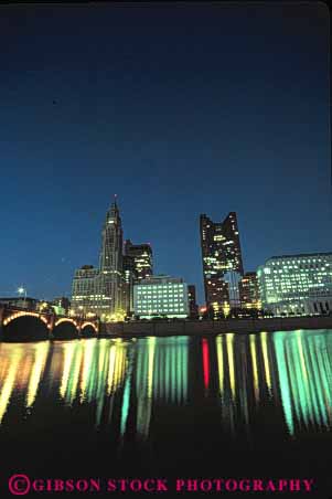 Stock Photo #7654: keywords -  america american architecture building buildings business center cities city cityscape cityscapes columbus dark downtown dusk evening high light modern new night office ohio reflect reflecting reflection reflects rise river scioto skyline skylines urban usa vert water