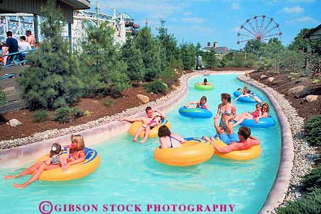 Stock Photo #19082: keywords -  child children colorful columbus drift drifting drifts equipment float floating floats fun horz lake leisure ohio park parks people person play playing pool pools recreation summer swim swimming tube tubing warm water waterpark waterparks wyandot
