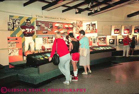 Stock Photo #14156: keywords - acknowledge acknowledges canton commemorate commemorates commemorating display displaying displays distinguish distinguished exhibit exhibiting exhibits fame football hall halls horz of ohio people pro sport sports stars