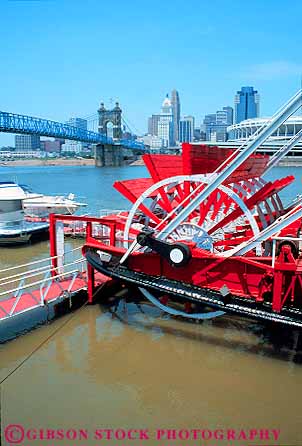 Stock Photo #11820: keywords -  axis boat boats buildings cincinnati cities city cityscape cityscapes downtown ohio paddle river riverboat riverboats rivers rotate rotates skyline skylines urban vert waterfront wheel