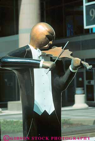 Stock Photo #11987: keywords - cities city cleveland downtown in music musician north ohio people person plaza plazas point sculpture sculptures urban vert