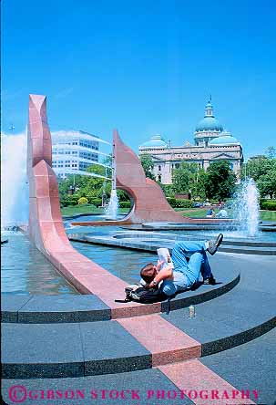 Stock Photo #17533: keywords -  building capitol fountain fountains indiana indianapolis magazine man municipal outdoor outdoors outside park parks plaza plazas public read reader reading reads relaxing state vert