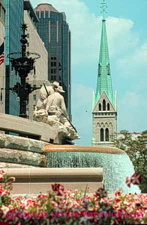 Stock Photo #7668: keywords - america american and architecture building buildings business center cities city cityscape cityscapes commemovrative downtown high indiana indianapolis memorial modern monument new office rise sailors skyline skylines soldiers urban usa vert