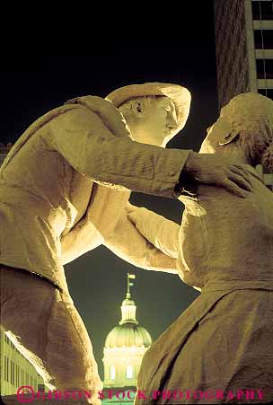 Stock Photo #13705: keywords -  american and building buildings comemmoates comemmorate comemmorating dark downtown evening heritage historic history honor honors indiana indianapolis lighting lights memorials monument monuments night sailor sailors soldier soldiers statue statues stone vert war wars