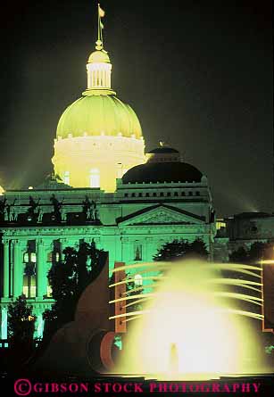 Stock Photo #11945: keywords -  building capitol capitols dome domes evening fountain fountains illuminated indiana indianapolis legislature light lighting midwest night politics state vert