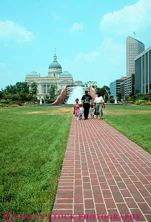 Stock Photo #11948: keywords - african american black capitol child children commons downtown ethnic families family indiana indianapolis midwest minority municipal parent parents park parks public summer vert walk walkers walking