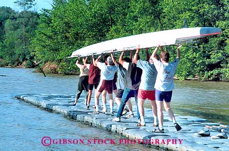 Stock Photo #19022: keywords -  activities activity boat boating boats carries carry carrying club clubs creek creeks crew eagle fun group horz indiana indianapolis lake lakes lift lifted lifting near open park parks people person public recreation row rowing rows space sport sports water