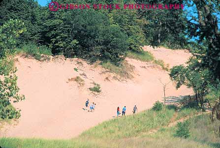 Stock Photo #14170: keywords -  beach beaches dune dunes great hike hiker hikers hiking horz indiana lake lakes lakeshore lakeshores michigan national outdoor outside park parks people play playing plays recreation region sand sanddune shore shoreline summer sunbath sunbathing sunny sunshine vacation walk walking warm