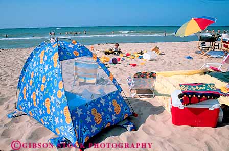 Stock Photo #14173: keywords -  beach beaches color colorful dunes great horz indiana lake lakes lakeshores material michigan nylon outdoor outside park parks people play playing plays recreation region sand shade shore shoreline state summer sunbath sunbathing sunny sunshine synthetic tent tents vacation warm