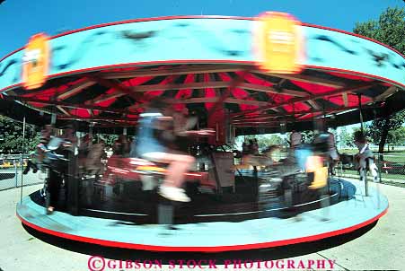 Stock Photo #19404: keywords - action amusement amusements bay beach blur blurred carousel carousels cone cones dynamic great green horz lakes motion move movement moves moving park parks people person public region ride rotate rotates rotating rotation spin spinning spins state summer wisconsin