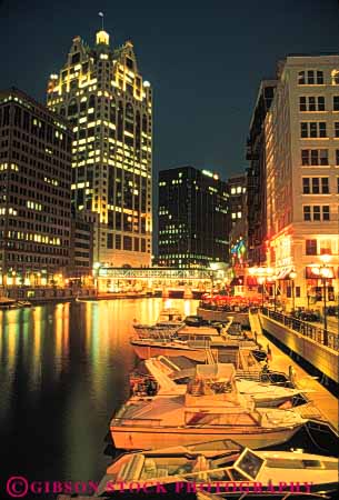 Stock Photo #7674: keywords -  america american architecture boat boats building buildings business cafe cafes center cities city cityscape cityscapes dark dine dining dock docks downtown dusk evening gather gathering high lighting lights marina marinas milwaukee modern new night office place restaurant restaurants rise river skyline skylines social urban usa vert water wisconsin