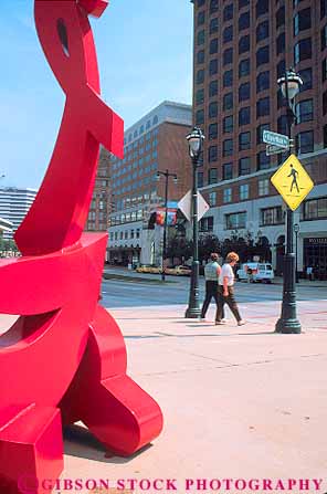 Stock Photo #11328: keywords -  abstract abstraction art downtown irregular milwaukee public red sculpture sculptures sidewalk urban vert wisconsin