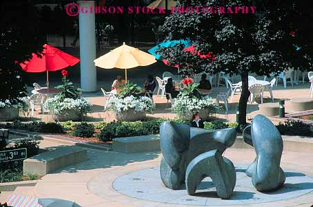 Stock Photo #11330: keywords - art building cafe cafes colorful federal front horz in milwaukee of outdoor outside park parks people plaza public relax relaxed relaxing sculpture sidewalk summer umbrella umbrellas wisconsin