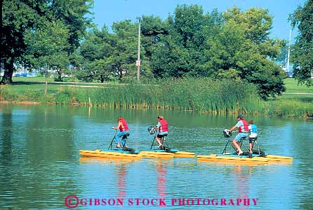 Stock Photo #11338: keywords -  bike bikes boat boating boats families family float floating flotation fun horz hydrobikes jacket jackets lake life milwaukee municipal park parks peddle peddling people play playing public recreation safe safety summer vest vests veterans wisconsin