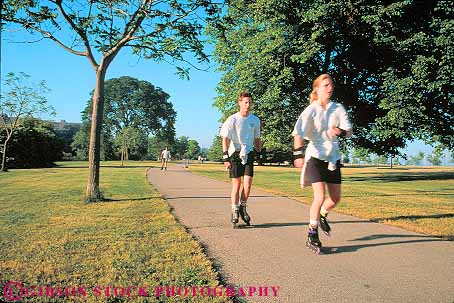 Stock Photo #11339: keywords - action couple exercise fitness fun health horz man milwaukee motion move movement moving municipal pair park parks people play public recreation roll roller rollerblade rollerblader rollerbladers rollerblading rollerskate rollerskater rollerskaters rollerskating rolling sidewalk team together two veterans wisconsin woman workout