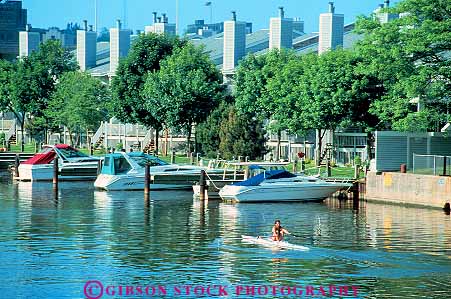 Stock Photo #11342: keywords - apartment boat boater boating building condo condominium condominiums condos dock docks exercise horz man marina marinas milwaukee resident residential river rivers row rower rowers rowing water waterfront wisconsin