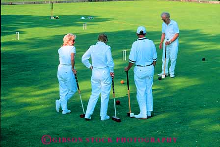 Stock Photo #11344: keywords -  activity adult age aged citizen citizens croquet elderly game games grass green horz lake lawn man mature men milwaukee old older outdoor outside pair pairs park playing recreation same sameness senior skill social sport sports summer team teams uniform white wisconsin woman women
